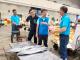 圖4 岡山魚市場總經理沈益平向石慶豐局長說明魚貨交易情形